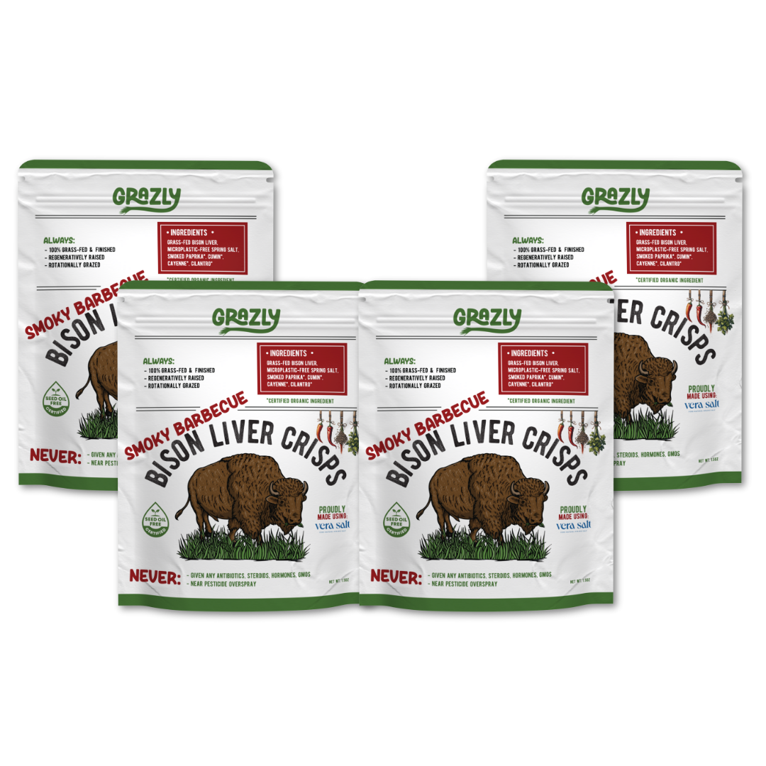 Multiple packages of smoky barbecue Grazzy Bison Liver Crisps on a white background