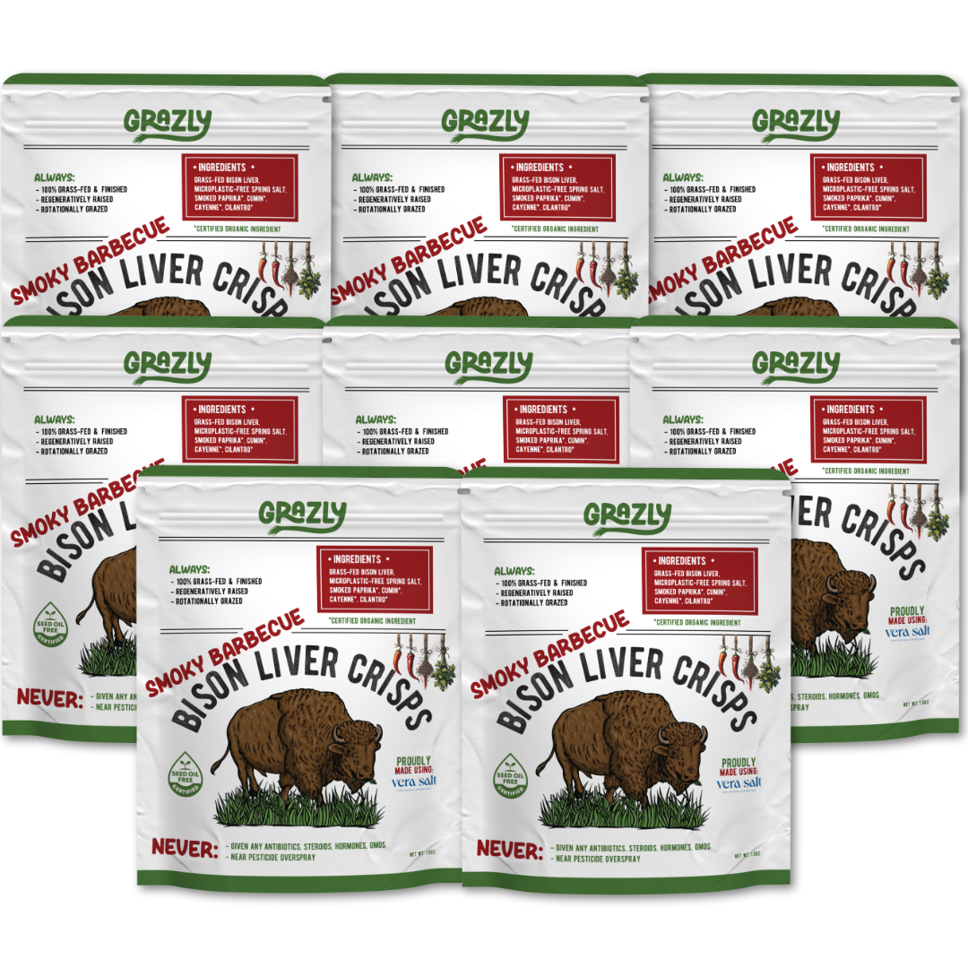 Multiple packages of Smoky Barbecue Bison Liver Crisps by Grazly on a white background