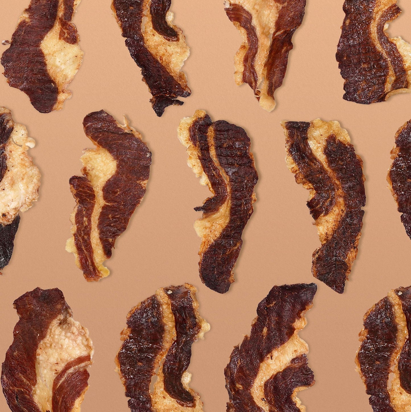 Pattern of Grazly Beef Brisket Slabs on a beige background