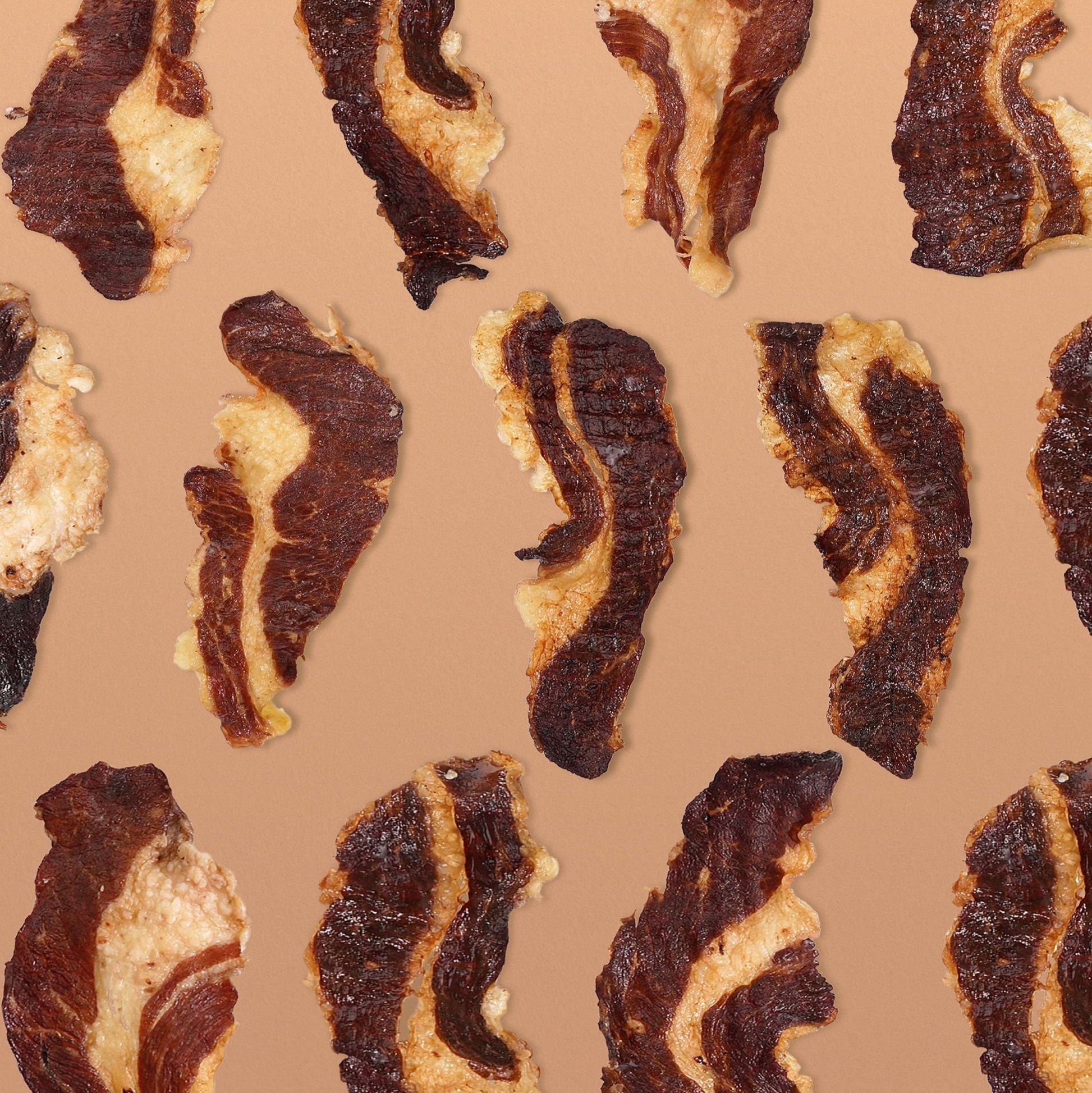 Pattern of Grazly Beef Brisket Slabs on a beige background